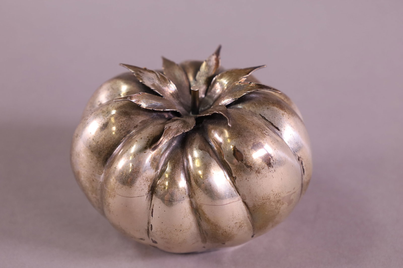 BUCCELLATI STERLING SILVER TOMATO: MARKED BUCCELLATI 925. 3" H. APPROX 127 GRAMS.
