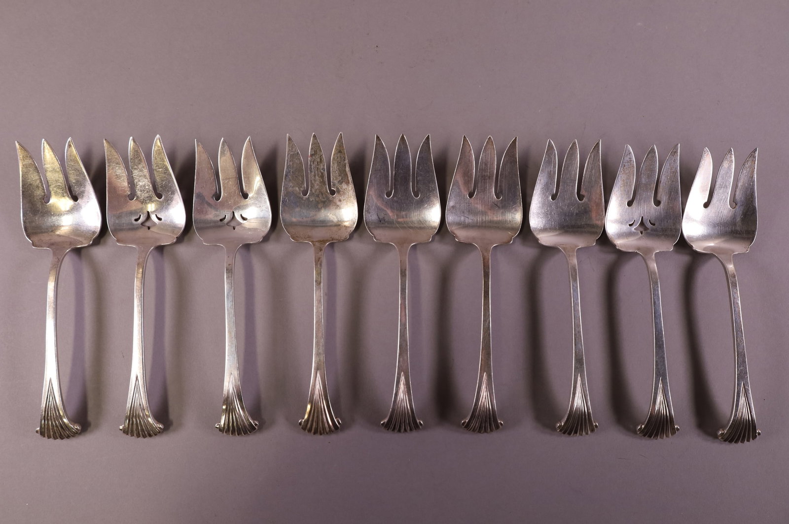NINE STERLING SILVER SERVING FORKS (1 of 3)
