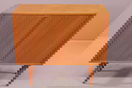 KAI KRISTIANSEN TWO DOOR RECORD CABINET: MID CENTURY MODERN TWO DOOR RECORD CABINET, BY KAI KRISTIANSEN FOR FELDBALLES MOBELFABRIK. 34" W x 16" D x 30" H. THIS ITEM EXCEEDS SIZE LIMITATIONS FOR IN HOUSE SHIPPING.
