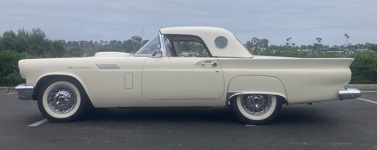 1957 Ford Thunderbird: VIN# D7FH26990. Colonial White in color, red interior. D Code 245HP 312. Fordomatic, power windows, hardtop (white), soft top (tan) with original frame, KH Wire Wheels, older Coker whitewall tires. Th