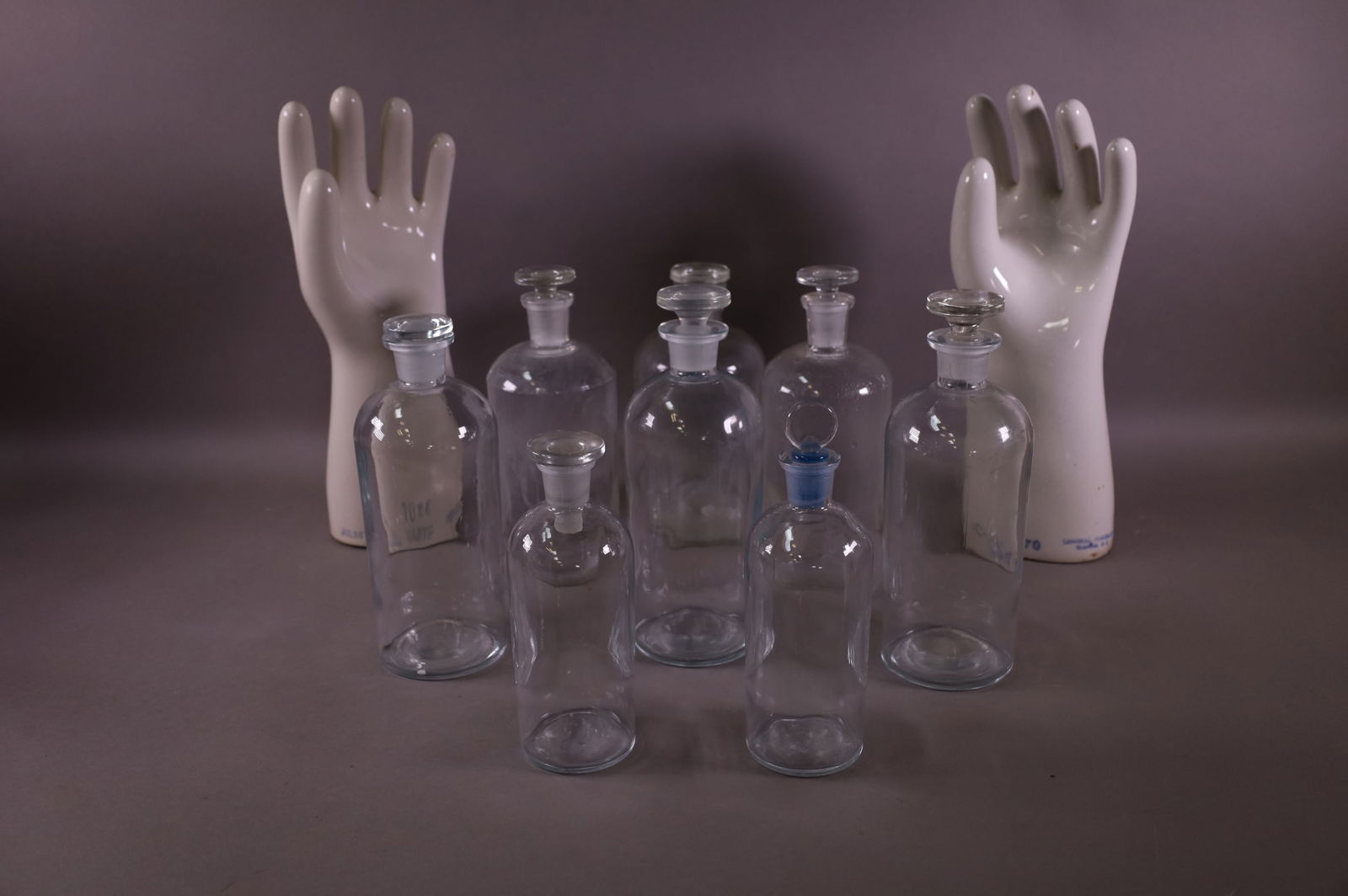 EIGHT APOTHECARY BOTTLES & TWO GLOVE FORMS (1 of 3)