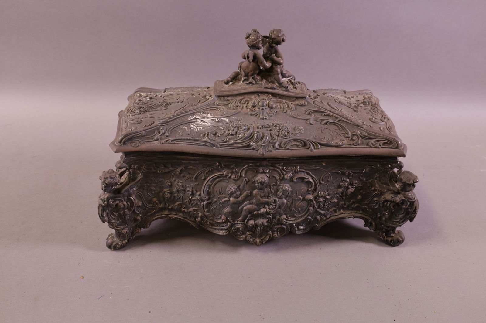 ANTIQUE FIGURAL JEWELRY CASKET (1 of 4)