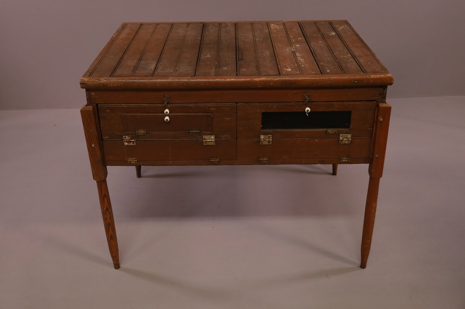 ANTIQUE INCUBATOR: PRIMITIVE INCUBATOR WITH ADDED LEGS. 38" L x 29" W x 31" H. THIS ITEM EXCEEDS SIZE LIMITATIONS FOR IN HOUSE SHIPPING.