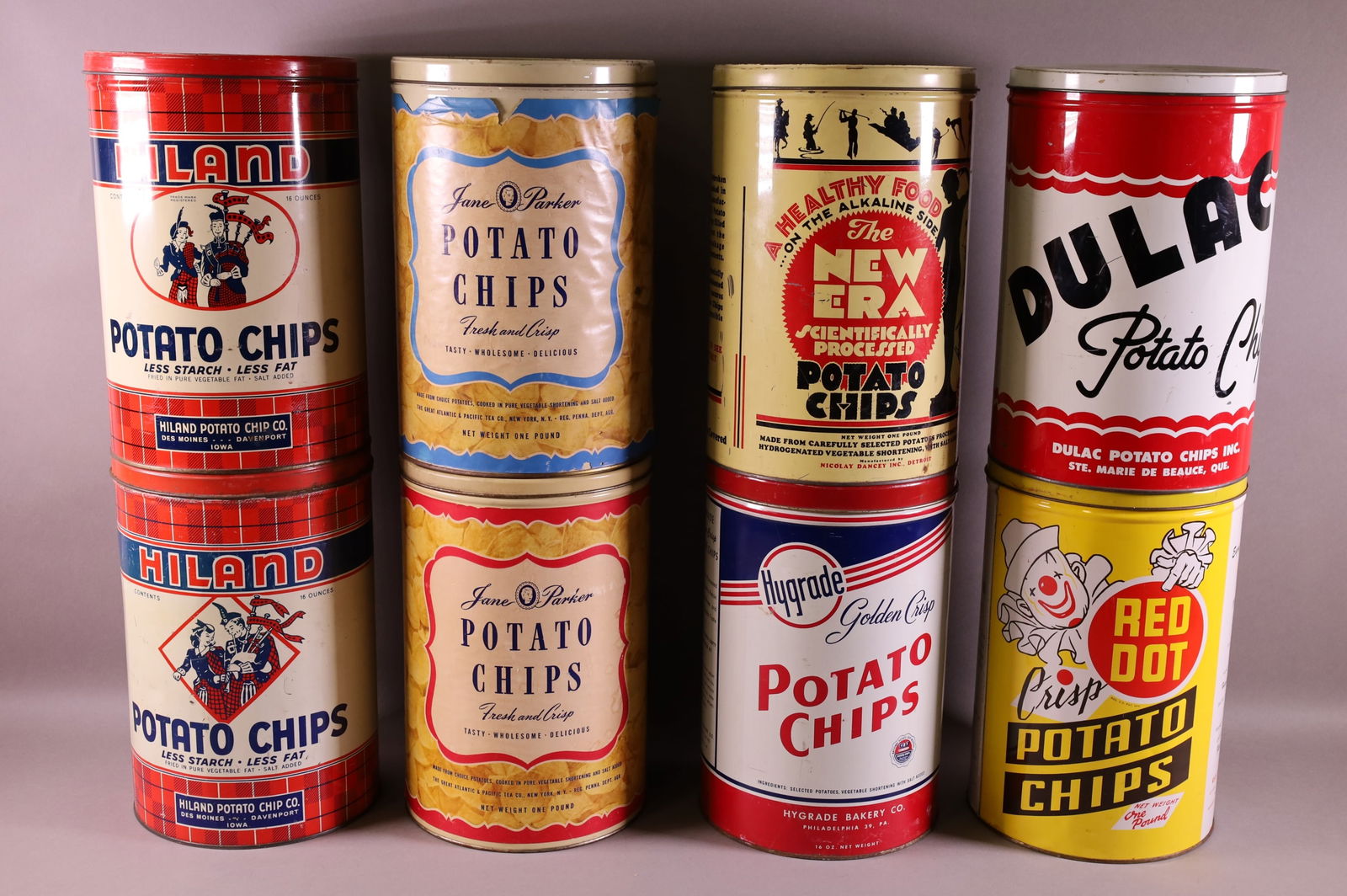 EIGHT POTATO CHIP TINS (1 of 2)