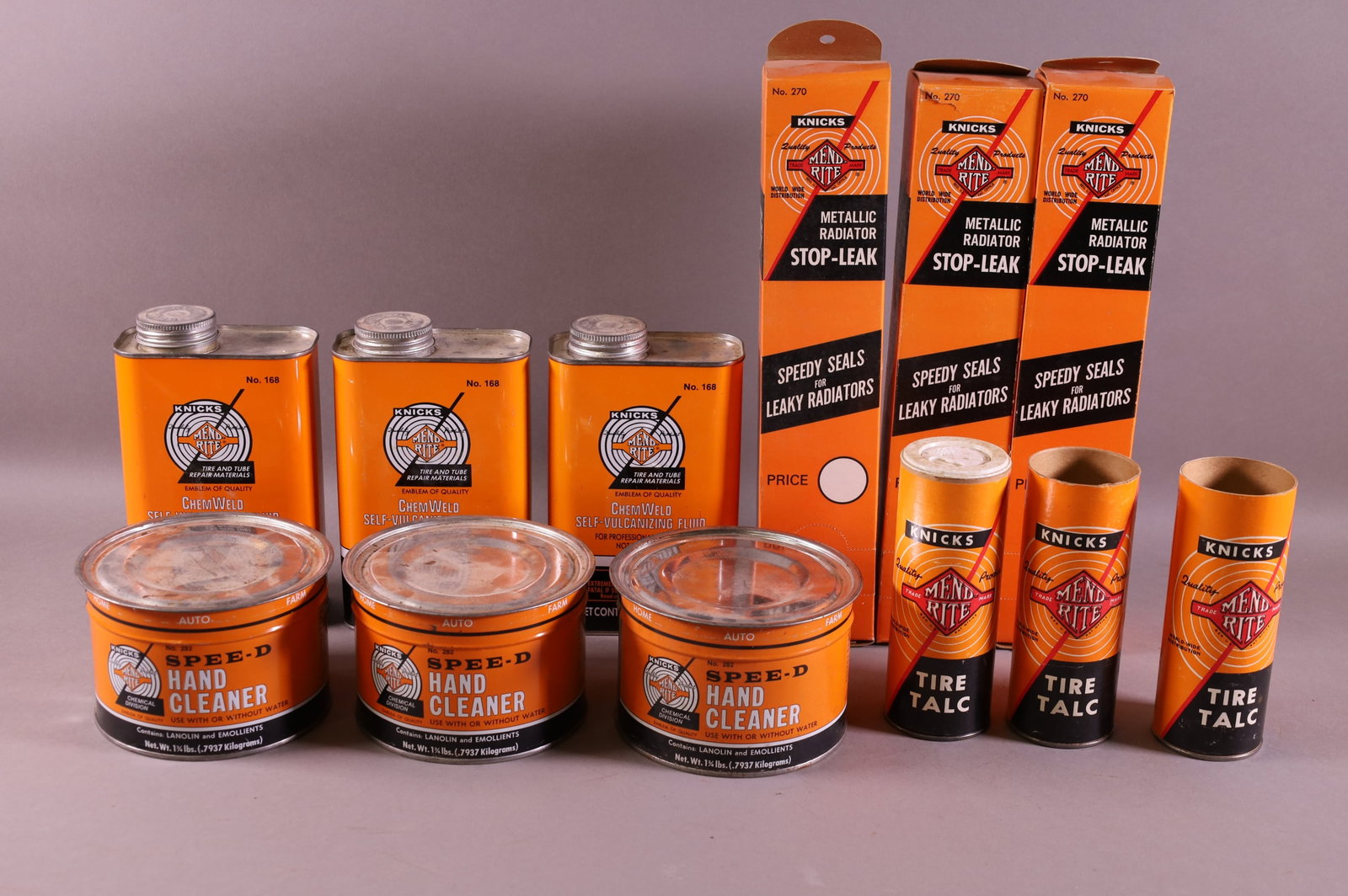 LOT OF KNICKS MEND RITE ITEMS: HAND CLEANER, TIRE TALC, RADIATOR STOP LEAK.