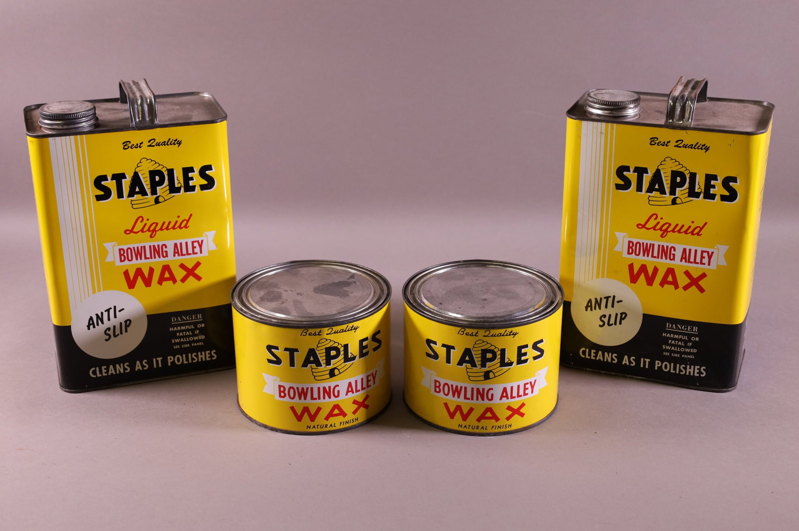 FOUR STAPLES BOWLING ALLEY WAX CANS: ANTI SLIP BOWLING ALLEY WAX.