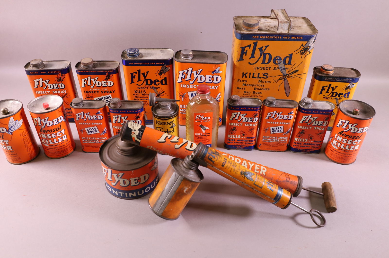LARGE LOT OF FLYDED ITEMS: CANS, SPRAYERS, & BOTTLES.
