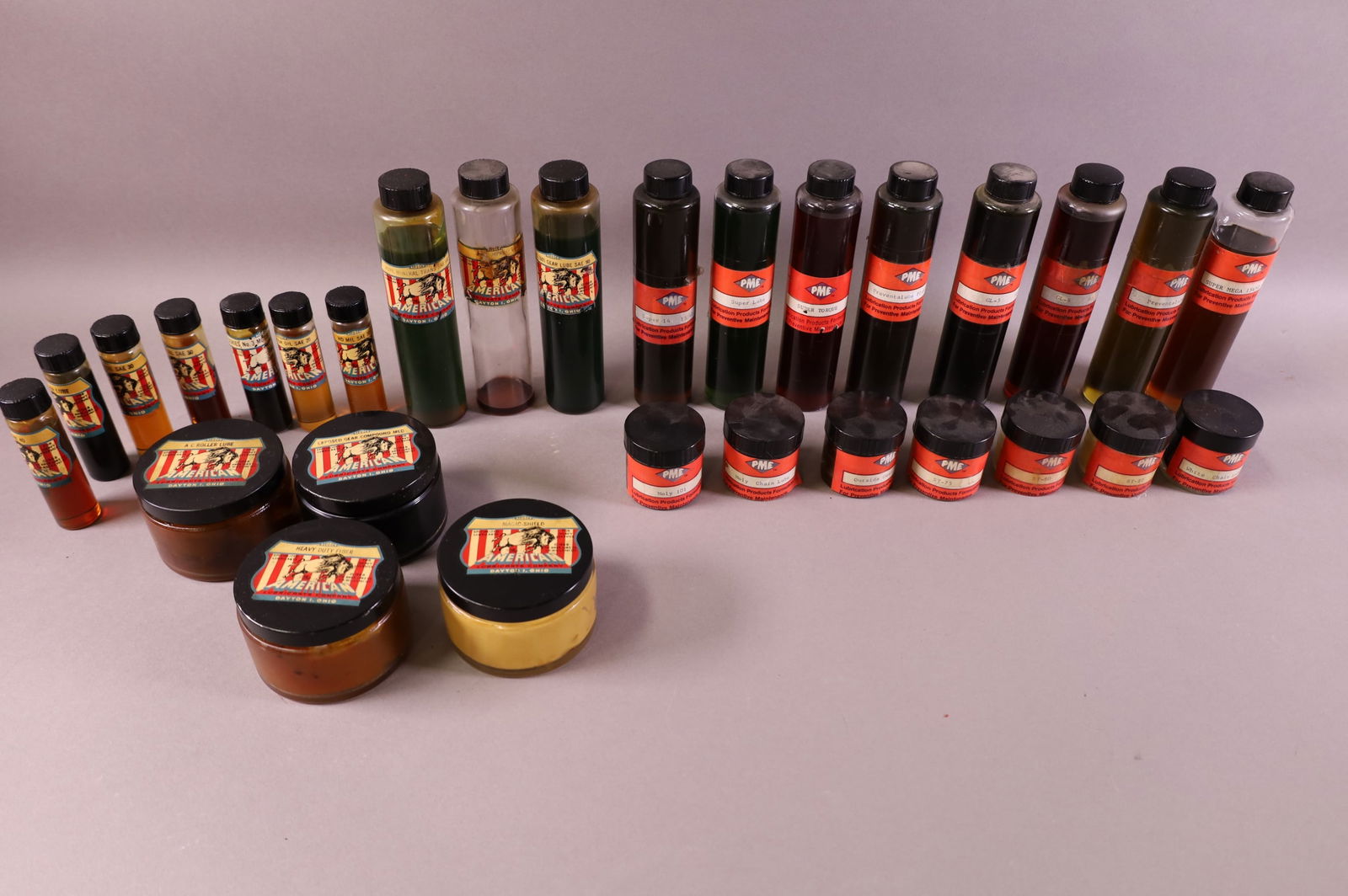 29 SALESMAN SAMPLE OIL BOTTLES & JARS (1 of 3)