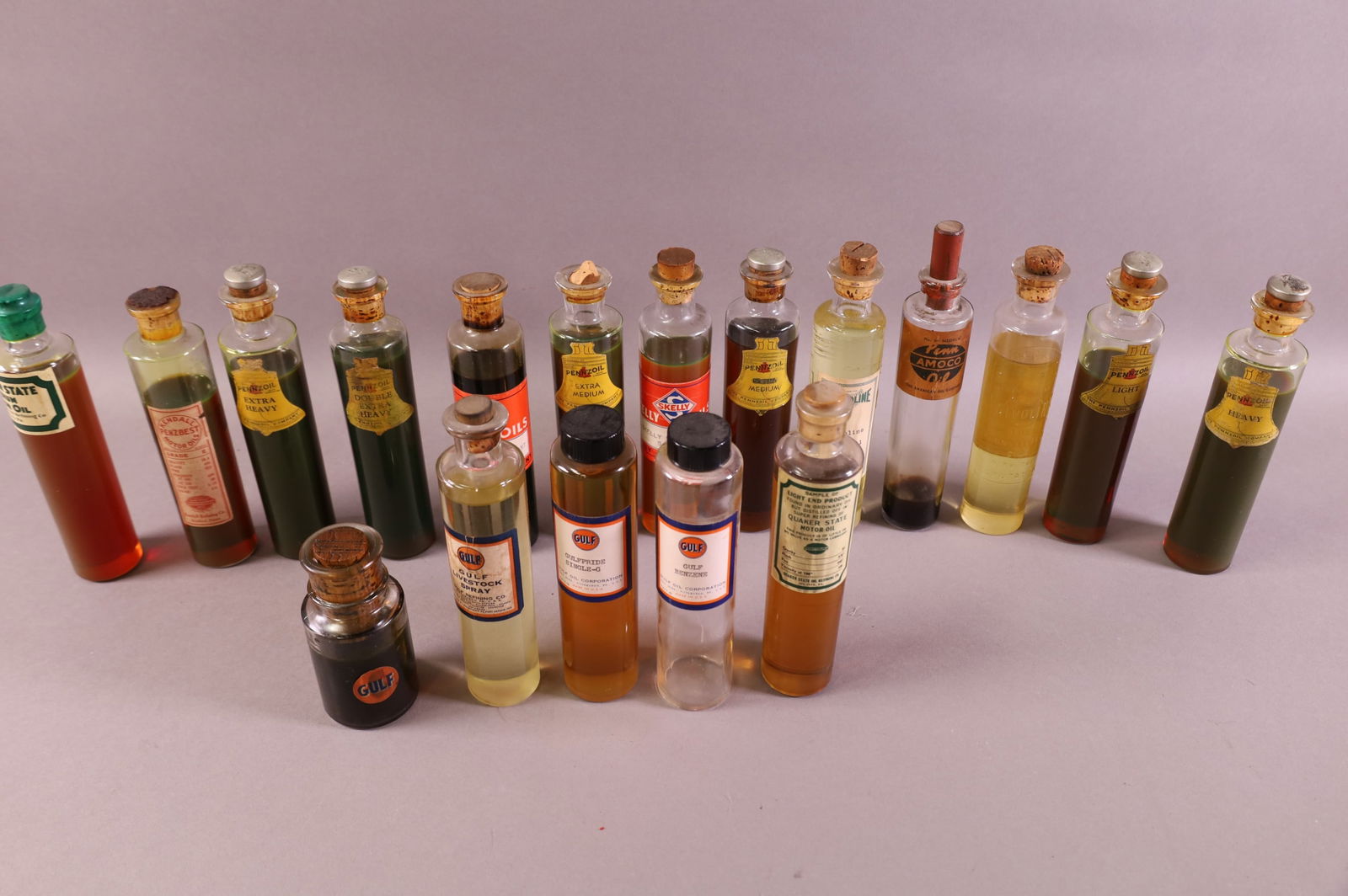 18 SALESMAN SAMPLE OIL BOTTLES (1 of 1)