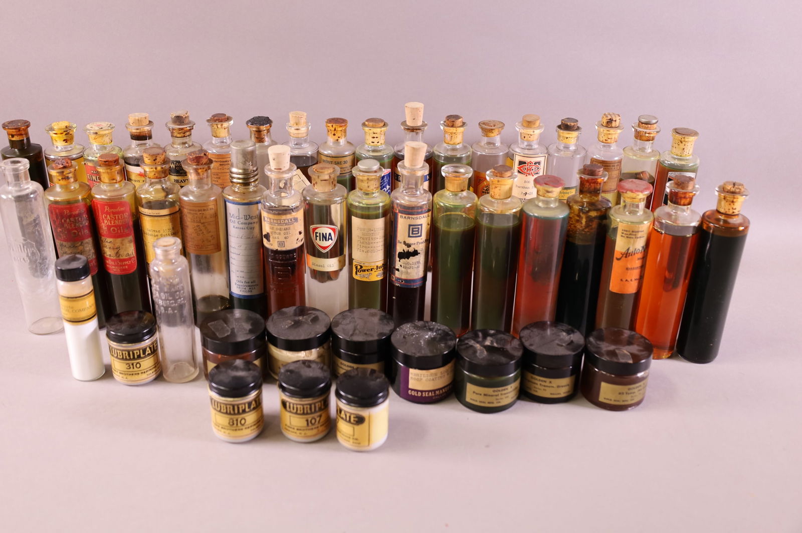 LARGE COLLECTION OF SALESMAN SAMPLE OIL BOTTLES (1 of 3)
