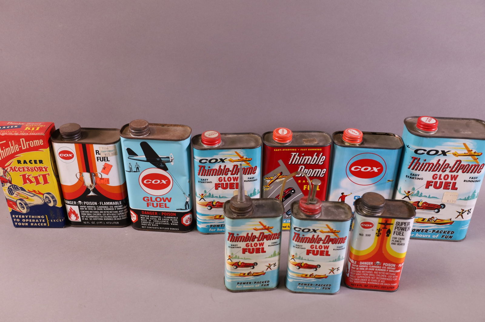 NINE COX THIMBLE DROME OIL CANS & 1 BOX: HANDY OILERS AND QUART CANS.