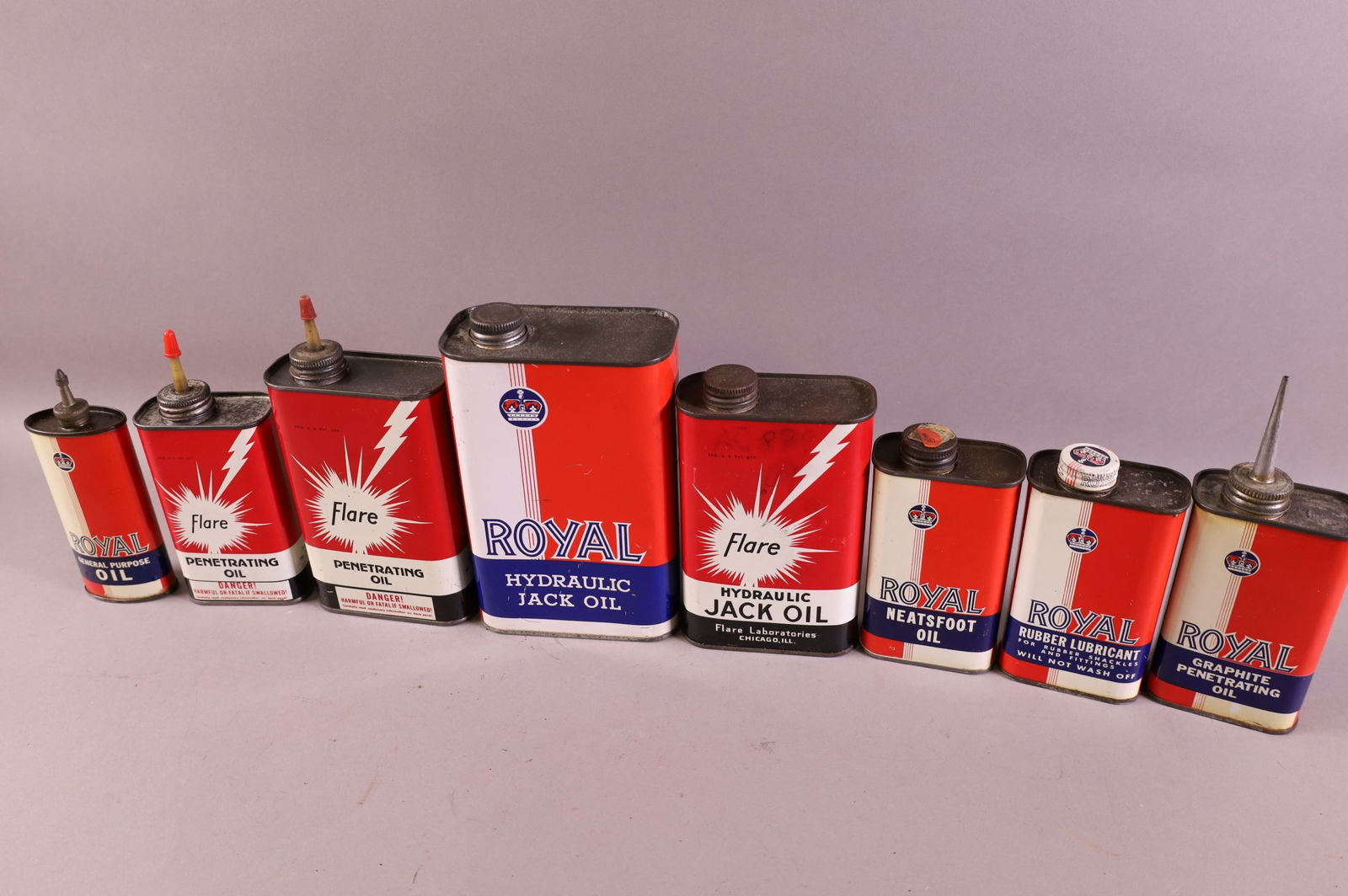 EIGHT ROYAL OIL CANS (1 of 1)