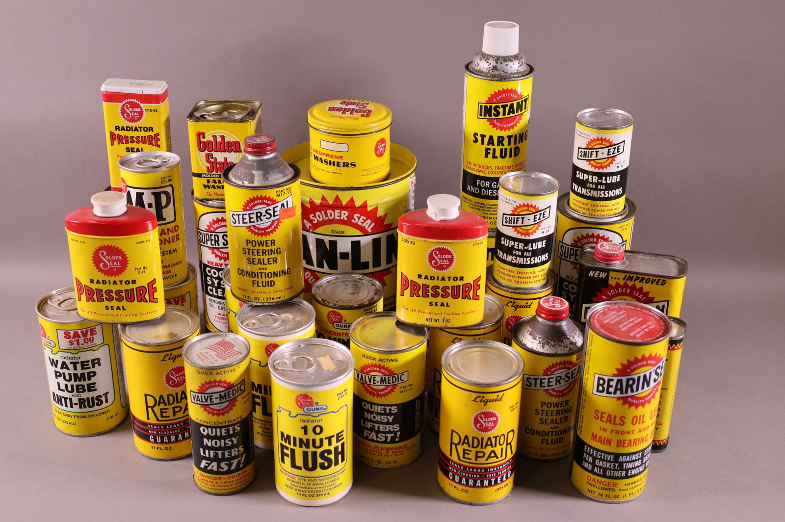 COLLECTION OF SOLDER SEAL CANS & BOTTLES (1 of 2)