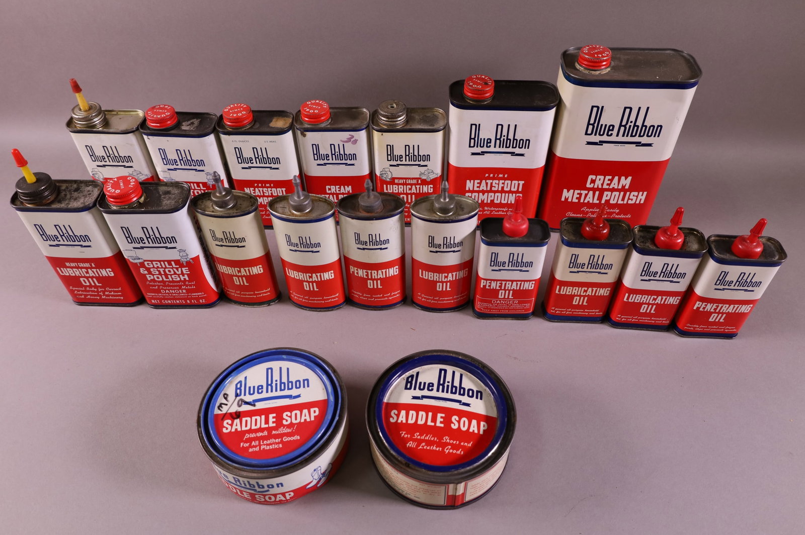 19 BLUE RIBBON CANS: PENETRATING OIL, SADDLE SOAP, POLISH, AND MORE.