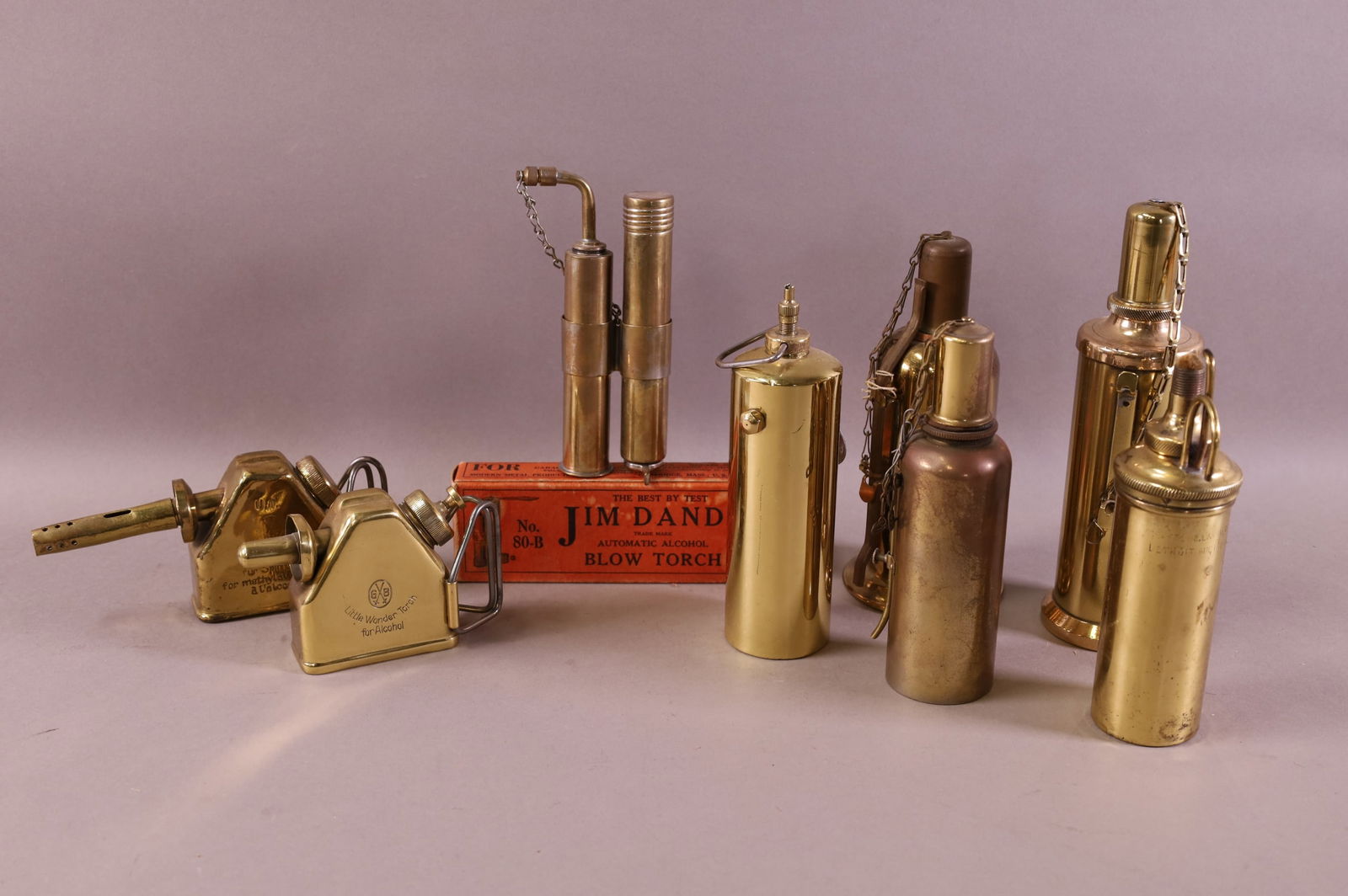 EIGHT SMALL BRASS TORCHES (1 of 4)
