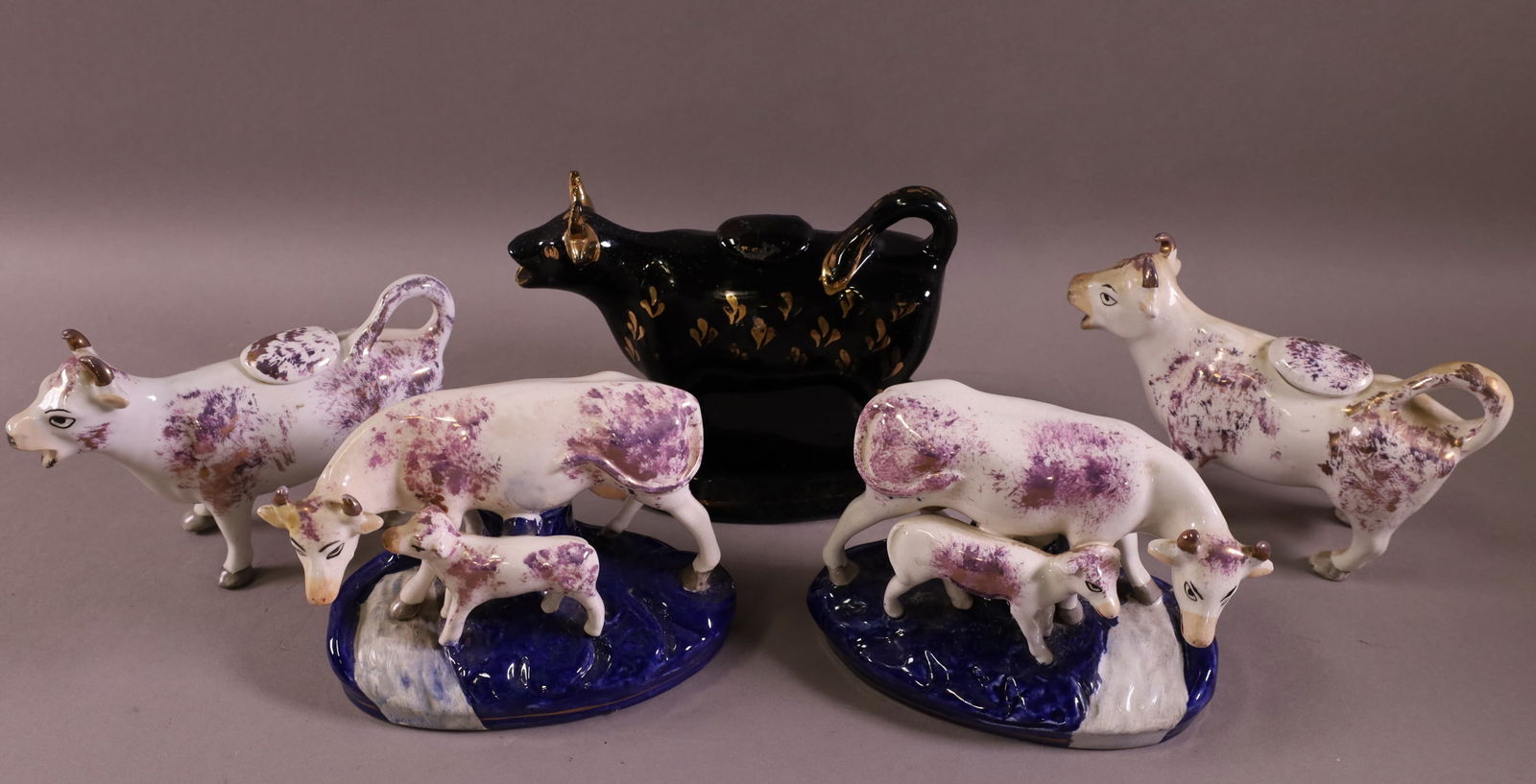 FIVE COW PORCELAIN FIGURES (1 of 4)
