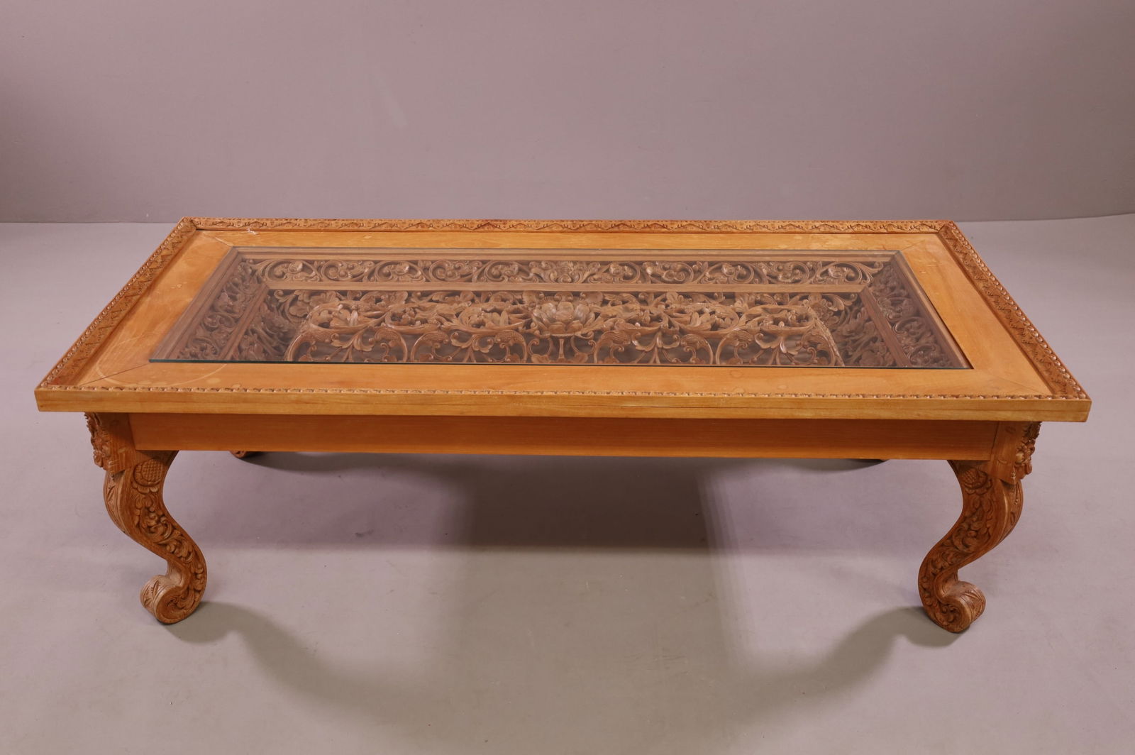 HIGHLY CARVED ASIAN COFFEE TABLE (1 of 3)