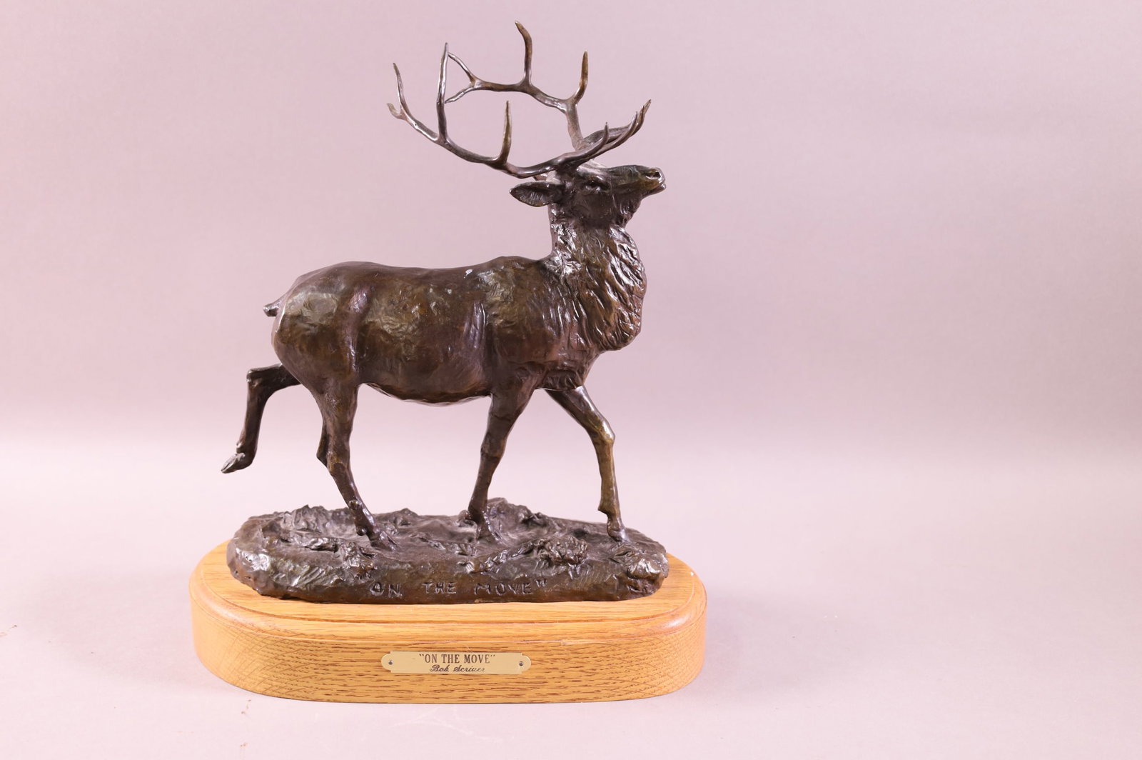 ELK BRONZE: TITLED "ON THE MOVE" SIGNED BOB SCRIVER. ON WOODEN BASE. No 146/250 DATED 1987. 13" H.