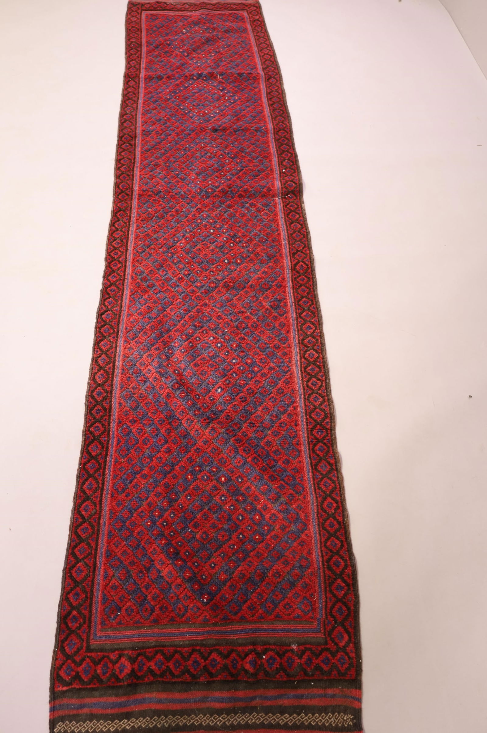 APPROX 9' 4" x 2' HANDMADE WOOL RUG (1 of 4)