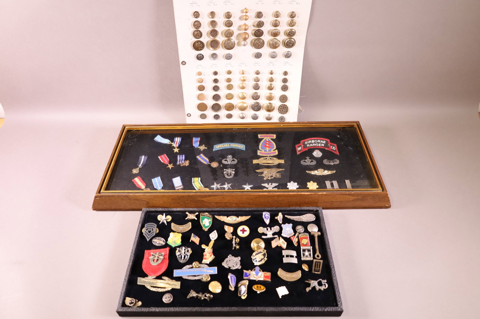 COLLECTION OF MILITARY ITEMS: PATCHES, MEDALS, PINS, AND \MORE.