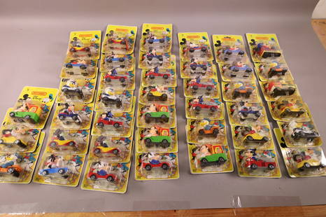 COLLECTION OF DISNEY MATCHBOX CARS ON CARDS: APPROX 40 PIECES. IN PACKAGING, MICKEY, GOOFY, AND MORE.