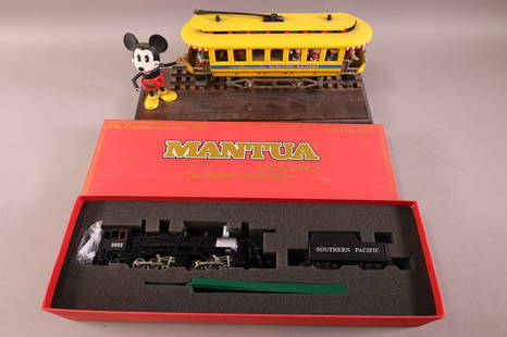 2 TOY TRAINS: MANTUA CLASSIC HO ENGINE AND TENDER IN ORIGINAL BOX. & WALT DISNEY ELECTRIC RAILWAY, DAMAGE TO MICKEY. PLAYED WITH CONDITION.