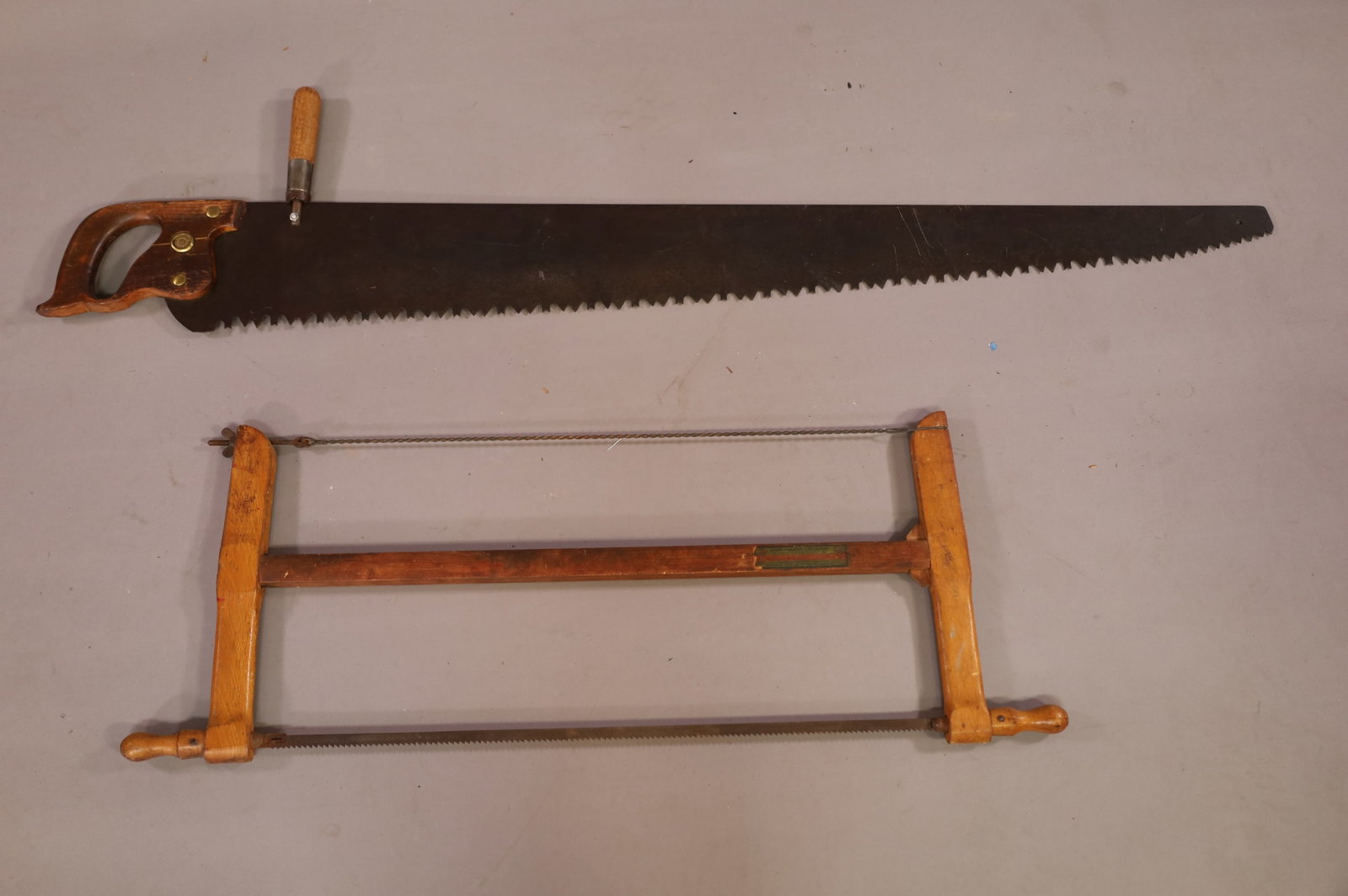 TWO ANTIQUE SAWS (1 of 2)