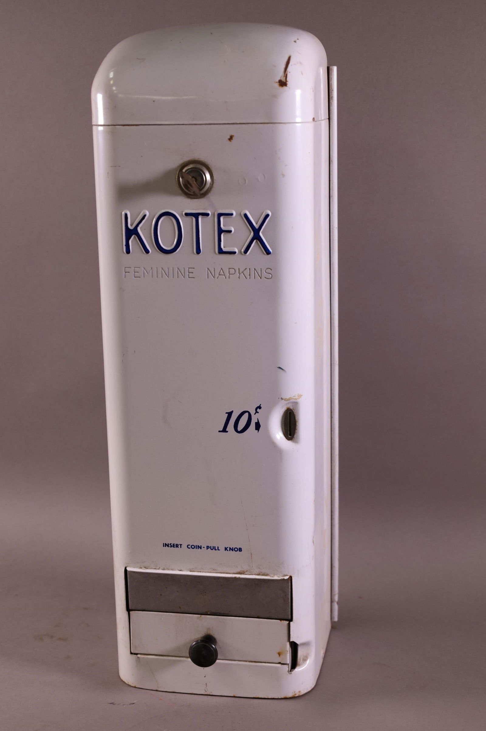 10 CENT KOTEX DISPENSER (1 of 2)