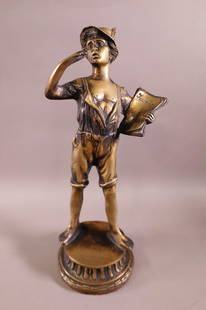 "JOURNAL" LITTLE BOY METAL STATUE: BOY WITH NEWSPAPER STATUE, UNSIGNED. APPEARS TO BE BRONZE. 13 1/2" H