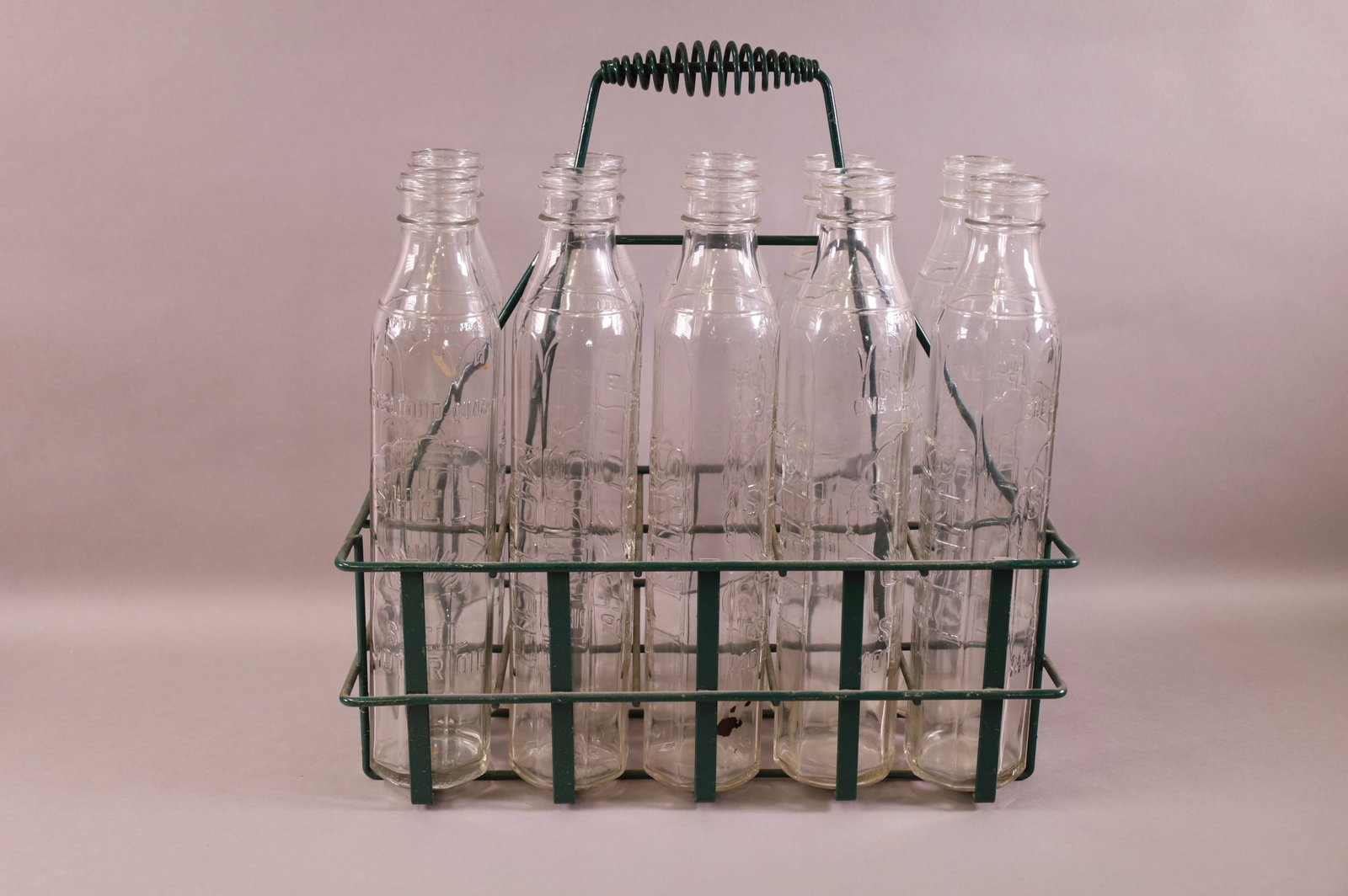 TEN ANTIQUE SHELL OIL BOTTLES (1 of 2)