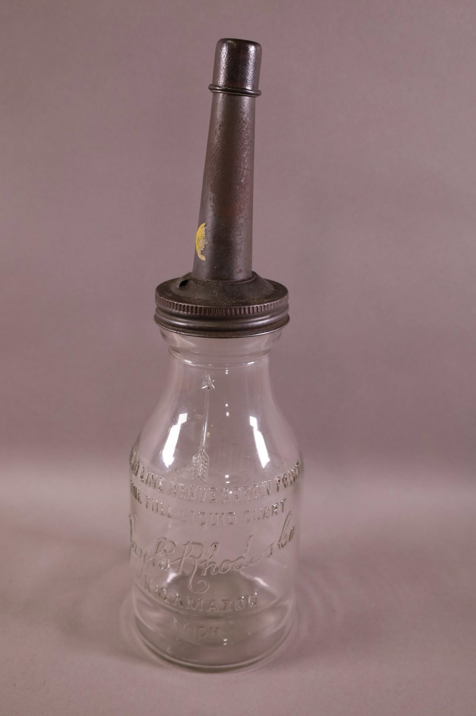 EMBOSSED PHILLIPS 66 OIL BOTTLE (1 of 2)