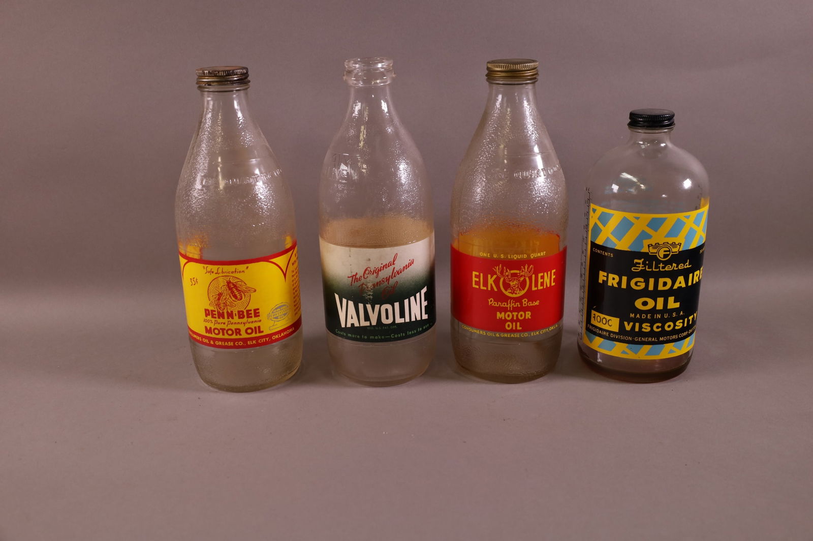 4 MISC. OIL BOTTLES (1 of 2)