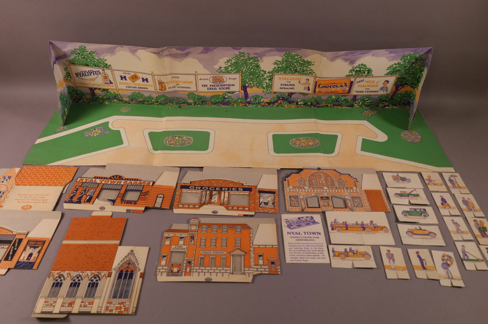 NYAL COUNTER TOP TOWN DIORAMA: FOLDS AND CREASES.