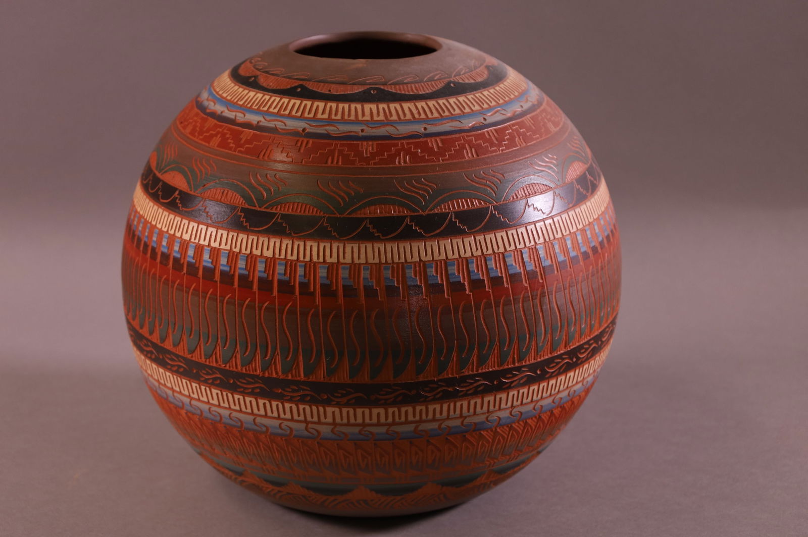 NATIVE AMERICAN POTTERY BOWL: ETCHED POTTERY BOWL, MARKED ON BASE EVIE W. DINE. 10 1/2" DIAM x 9 1/4" H