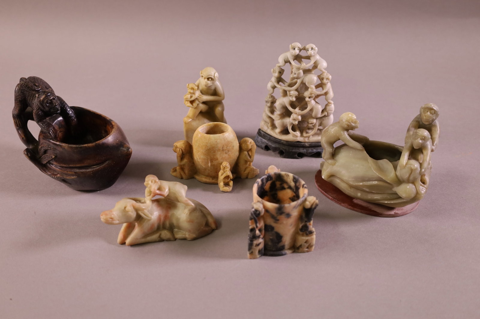COLLECTION OF SOAPSTONE FIGURES: MOSTLY MONKEY RELATED ITEMS. 2" - 4" H
