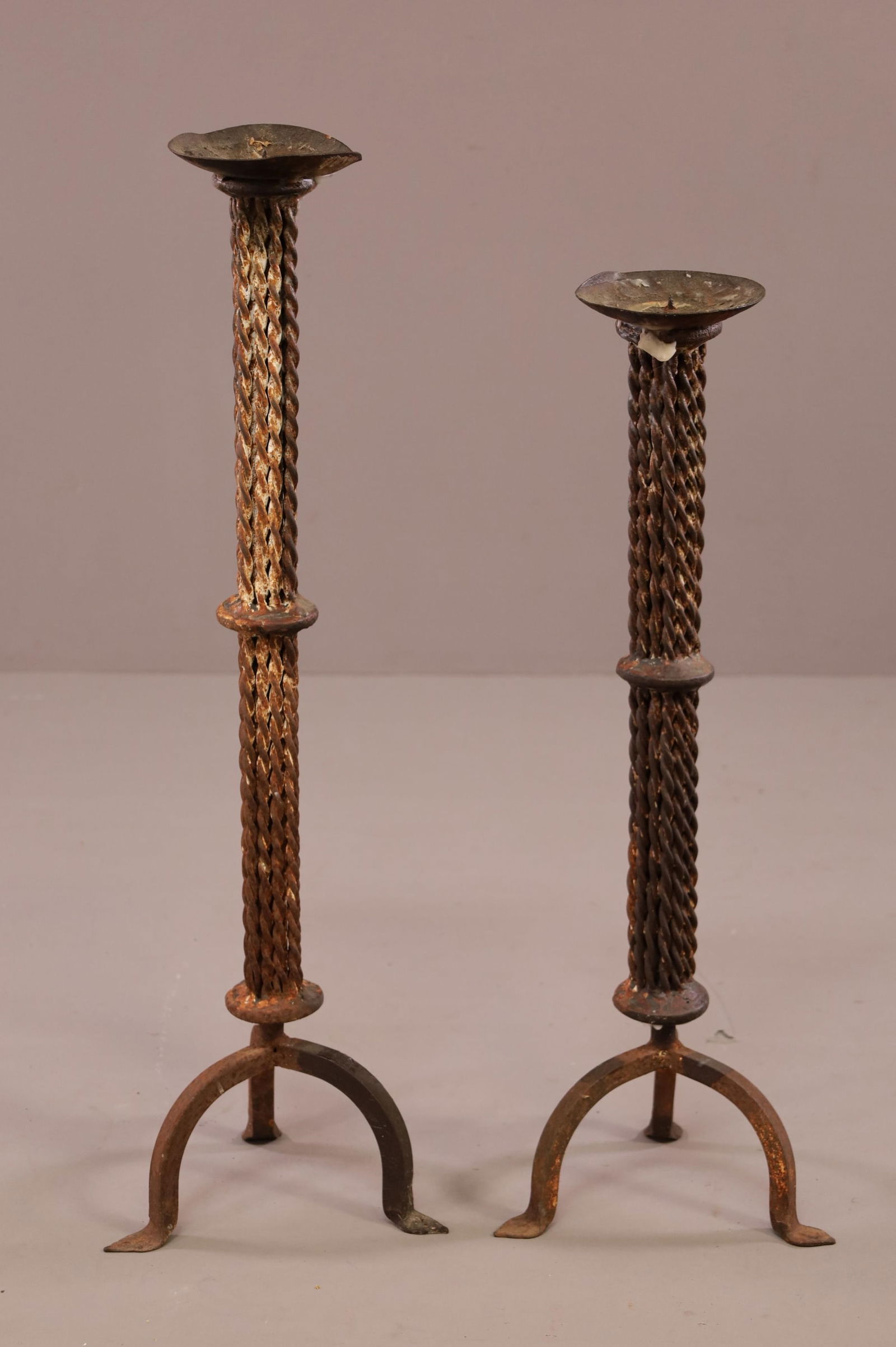 PAIR OF IRON CANDLESTICKS (1 of 3)