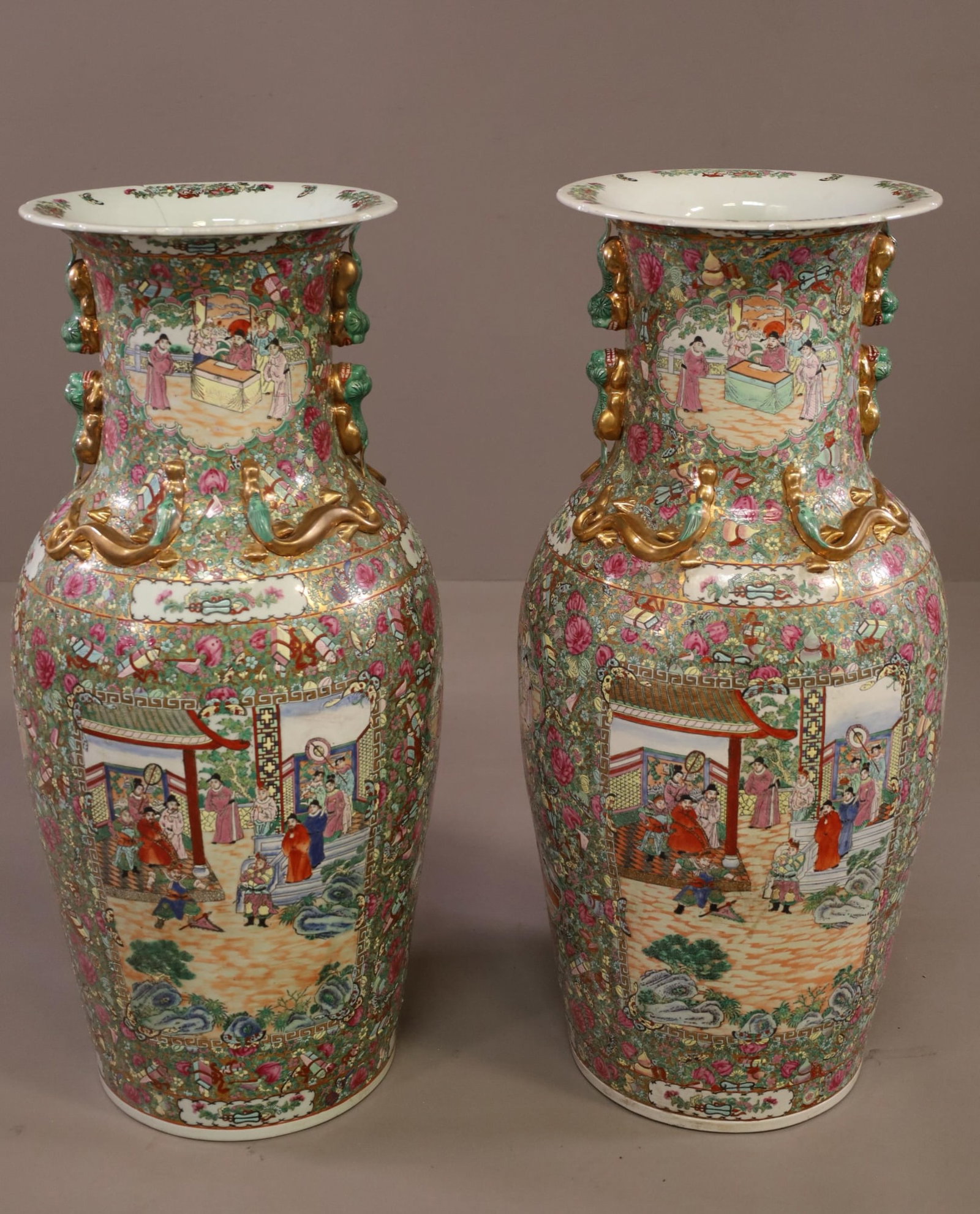 PAIR OF CHINESE PORCELAIN FLOOR VASES: FIGURAL AND FLORAL DECORATED CHINESE PORCELAIN TEMPLE JARS. ONE HAS SOME CHIPS AND CRACKS. 37" H. THIS ITEM EXCEEDS SIZE LIMITATIONS FOR IN HOUSE SHIPPING.