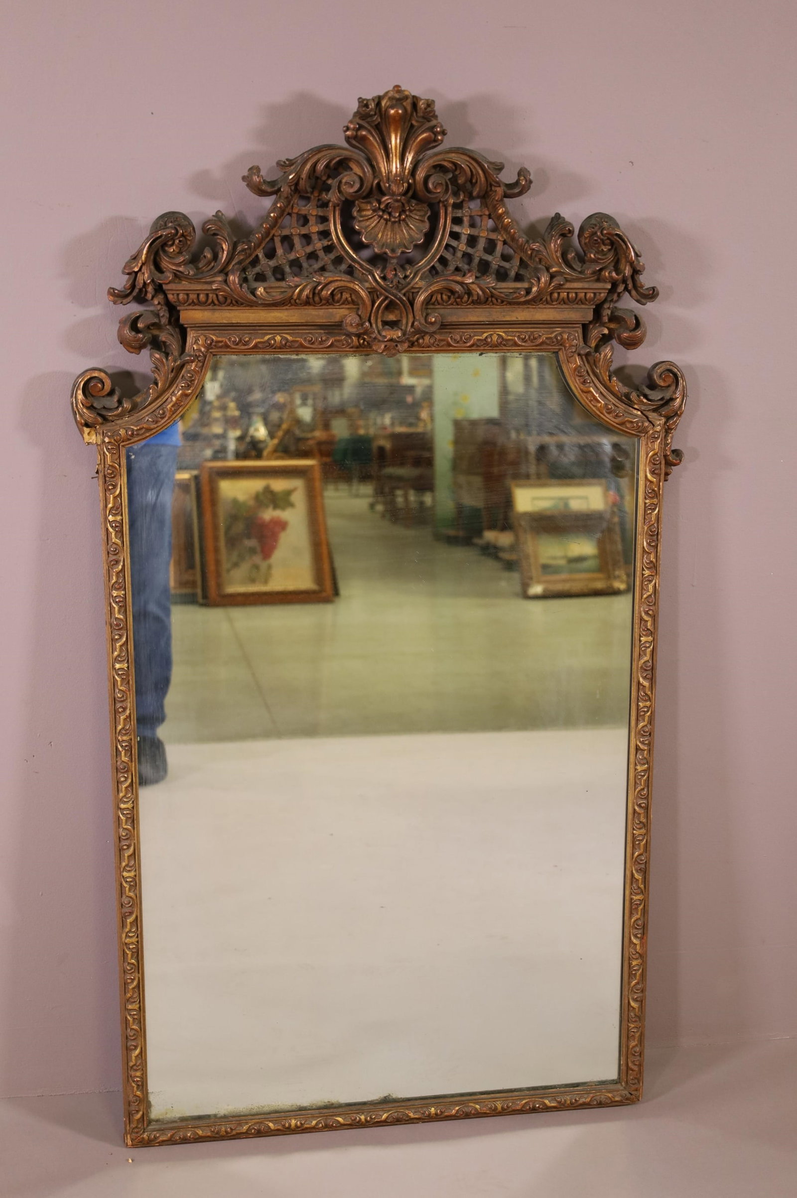 1900'S GOLD GILT WALL MIRROR: PIECE OF GESSO MISSING. CRACK TO GESSO. SILVERING IS CLOUDY. 30" X 53". THIS ITEM EXCEEDS SIZE LIMITATIONS FOR IN HOUSE SHIPPING.