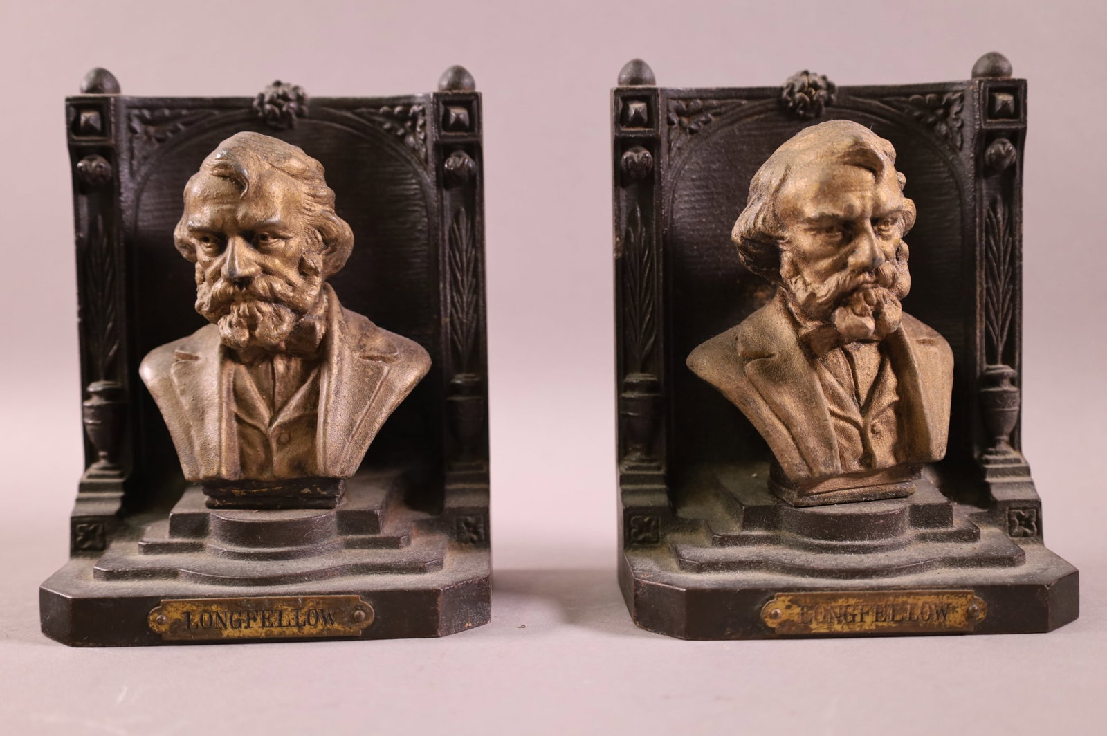 PAIR OF BRADLEY & HUBBARD IRON BOOKENDS: BRADLEY AND HUBBARD LONGFELLOW IRON BOOKENDS. 6" H.