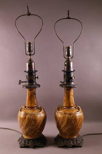 PAIR OF ANTIQUE MAJOLICA TABLE LAMPS: SINGLE SOCKET. ONE NEEDS NO PLUG. MINOR CRAZING. 29 1/2" TALL.