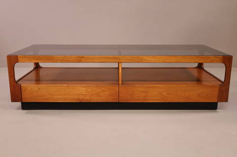 MID CENTURY BROWN SALTMAN COFFEE TABLE: MID CENTURY MODERN SMOKED GLASS COFFEE TABLE DESIGNED BY JOHN KEAL FOR BROWN SALTMAN. SINGLE LOWER DRAWER. 60" L x 24" W x 16" H. THIS ITEM EXCEEDS SIZE LIMITATIONS FOR IN HOUSE SHIPPING.