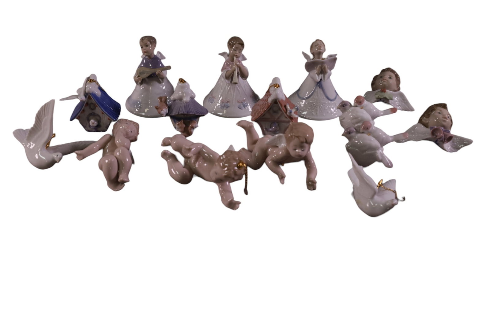 15 LLADRO CHRISTMAS ORNAMENTS: INCLUDING ANGELS, TREE HOUSES, BIRDS AND MORE.