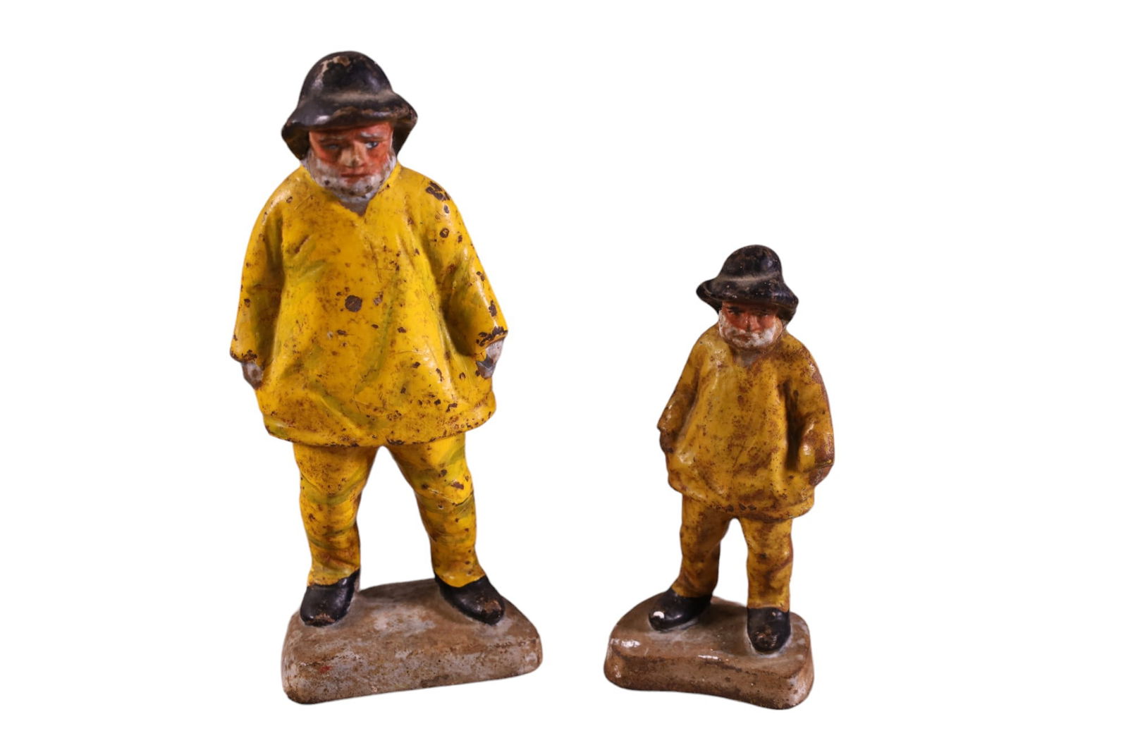 2 CAST IRON DOORSTOPS: CAST IRON DOORSTOPS, SAILORS. 6" & 8" H