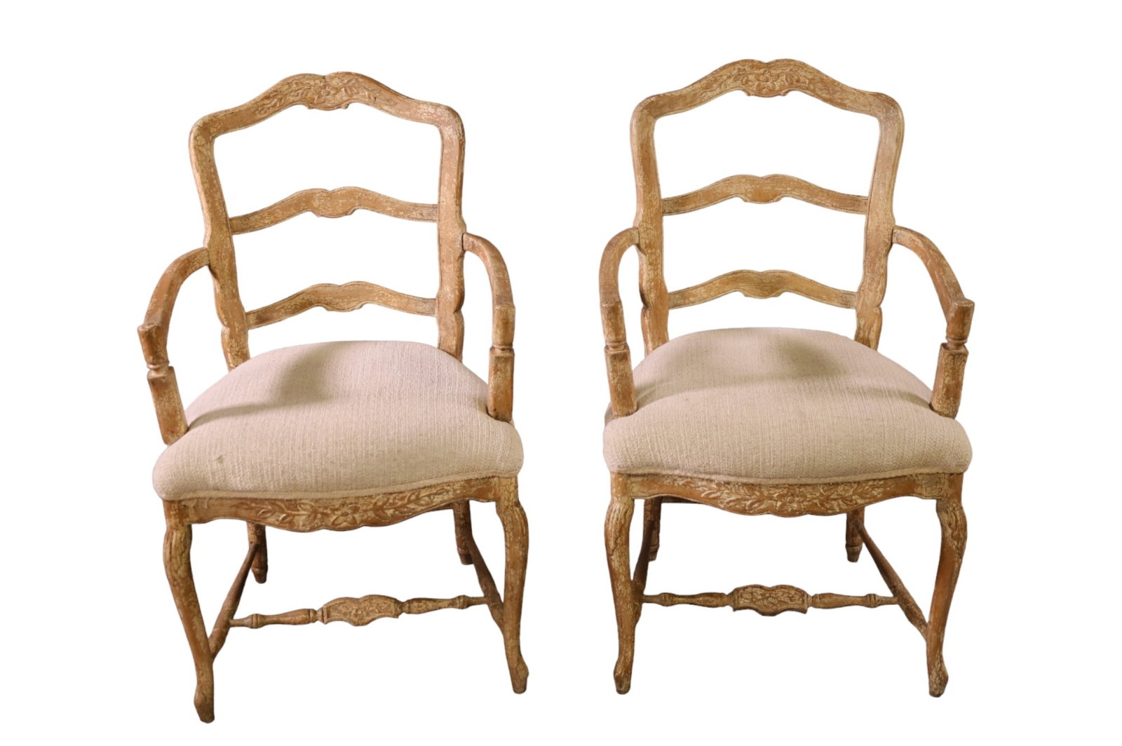 PAIR OF ARMCHAIRS: PAIR OF WHITE COUNTRY FRENCH ARMCHAIRS, ONE HAS DAMAGE TO FRAME. 23" W x 24" D x 38" H. THIS ITEM EXCEEDS SIZE LIMITATIONS FOR IN HOUSE SHIPPING.