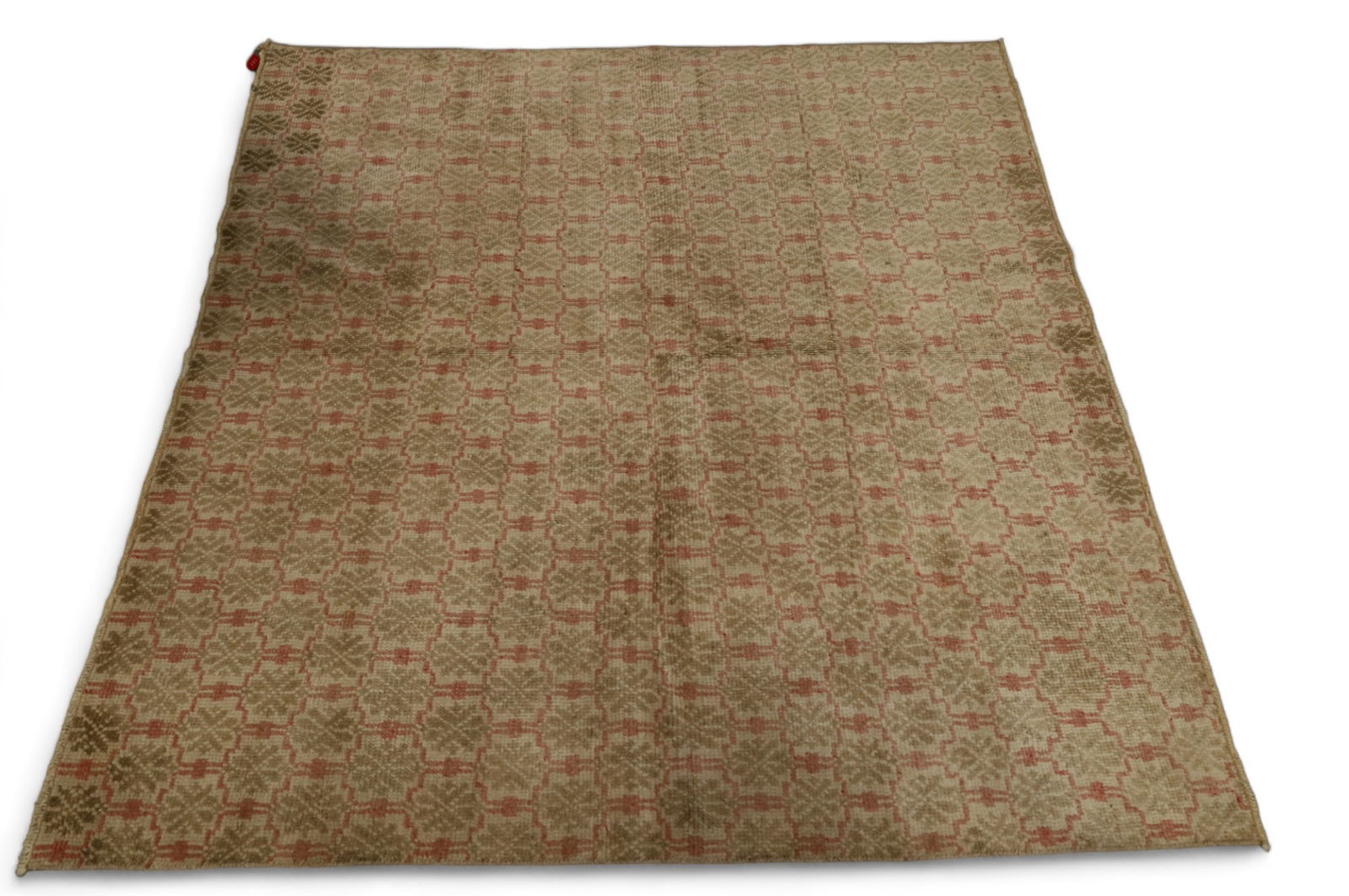 APPROX 5' 5" x 5' 5" HANDMADE WOOL RUG: HANDMADE OUSHAK WOOL RUG. HOLE TO CENTER.