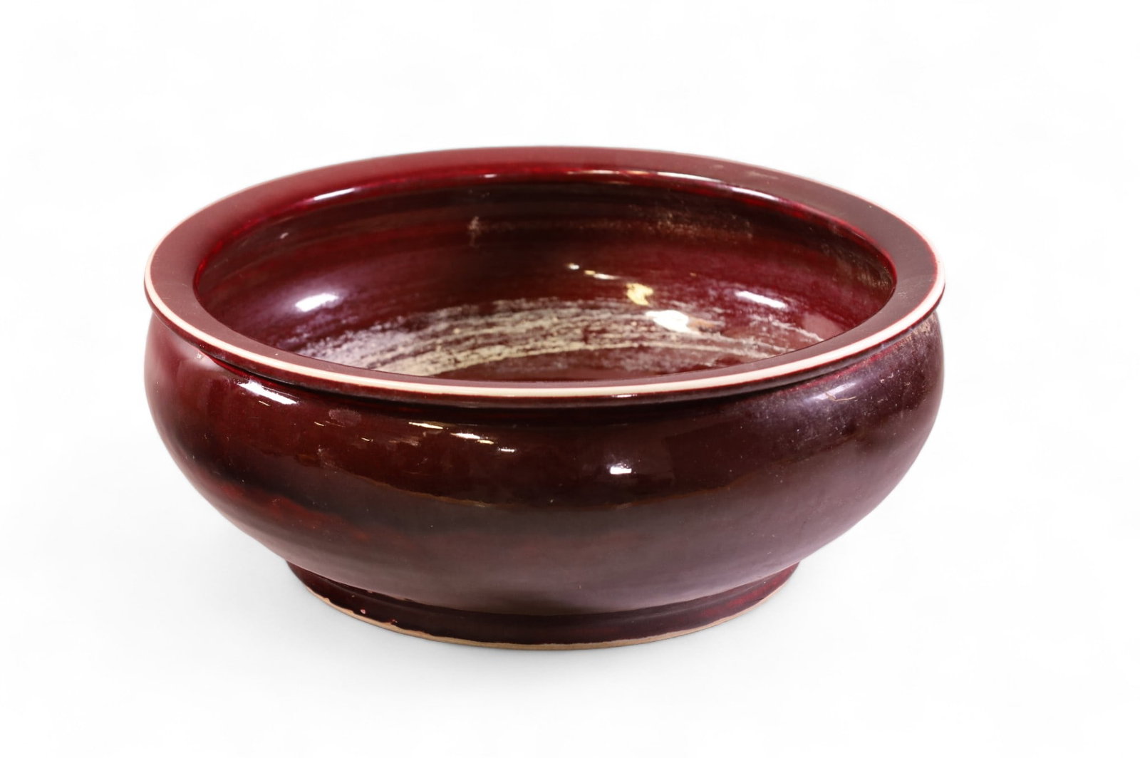 CHINESE PORCELAIN BOWL: OX BLOOD GLAZED PORCELAIN BOWL. UNSIGNED. 15" DIAM x 6" H.