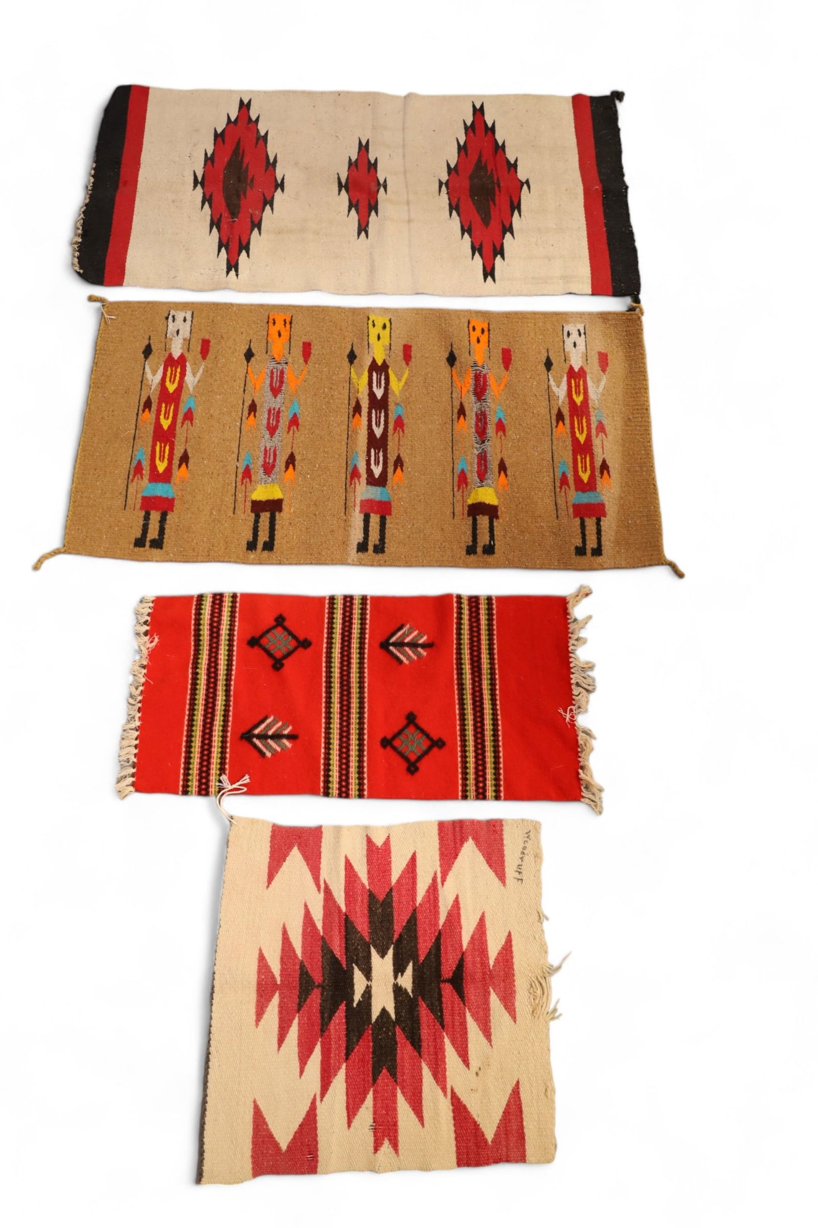 LOT OF 4 SMALL NATIVE AMERICAN STYLE RUGS: 3 ARE NATIVE AMERICAN. ALL HAVE STAINS & WEAR. RANGE IN SIZE FROM 41" X 20" TO 18" X 16"