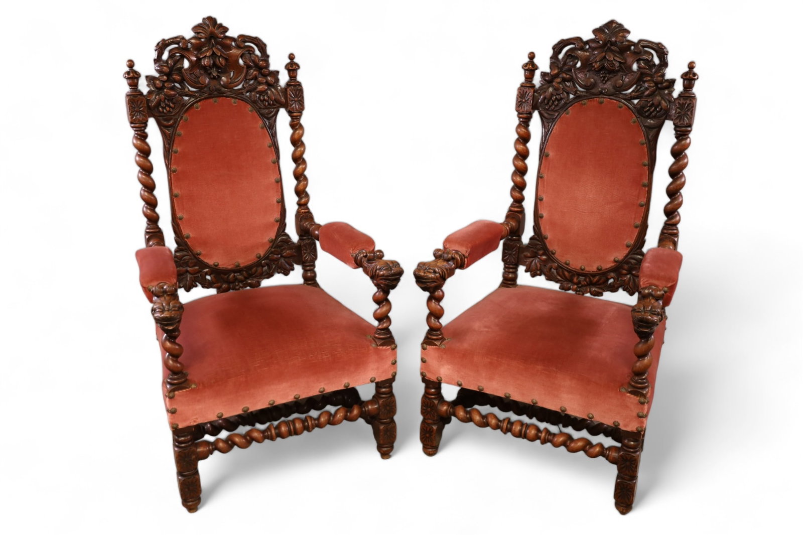 PR. 1900'S CARVED RENNAISANCE STYLE HALL CHAIRS: PAIR BARLEY TWIST ARMCHAIRS WITH LIONS & FRUIT. ONE HAS A LOOSE BACK. 26" X 21" X 51". ITEM EXCEEDS SIZE LIMITATIONS FOR IN HOUSE SHIPPING.