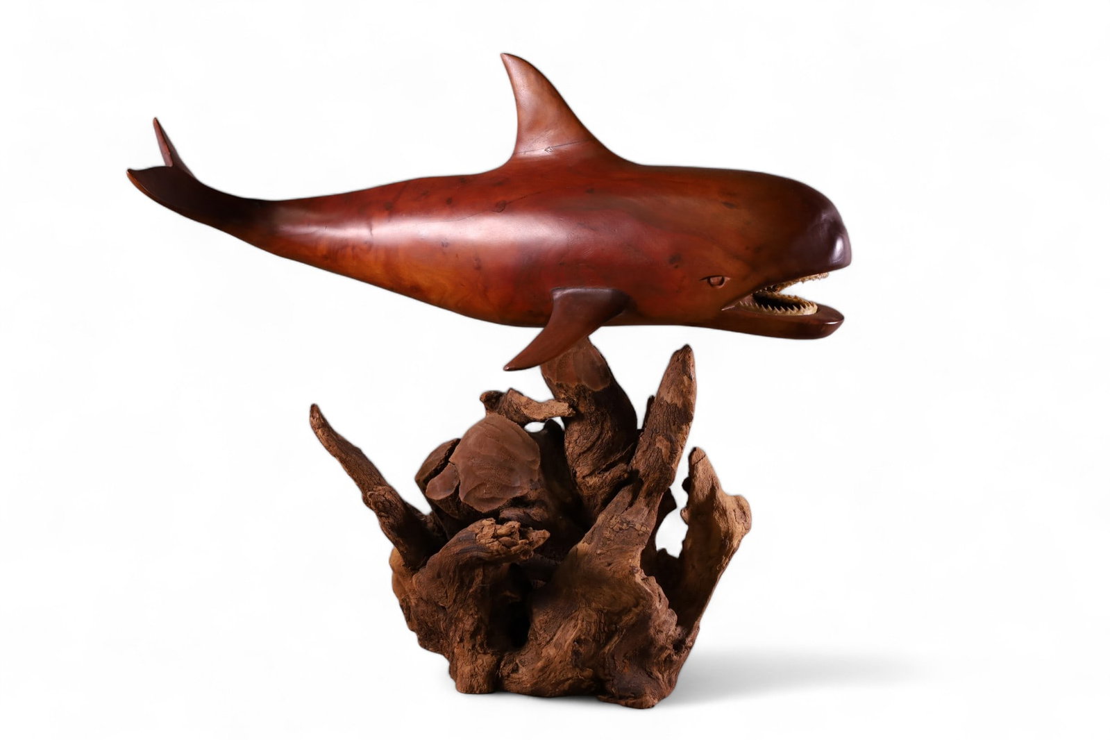 UNUSUAL CARVED WOOD WHALE: CARVED WOODEN WHALE SCULPTURE, ON DRIFTWOOD BASE.. 27" L x 22" H. THIS ITEM EXCEEDS SIZE LIMITATIONS FOR IN HOUSE SHIPPING