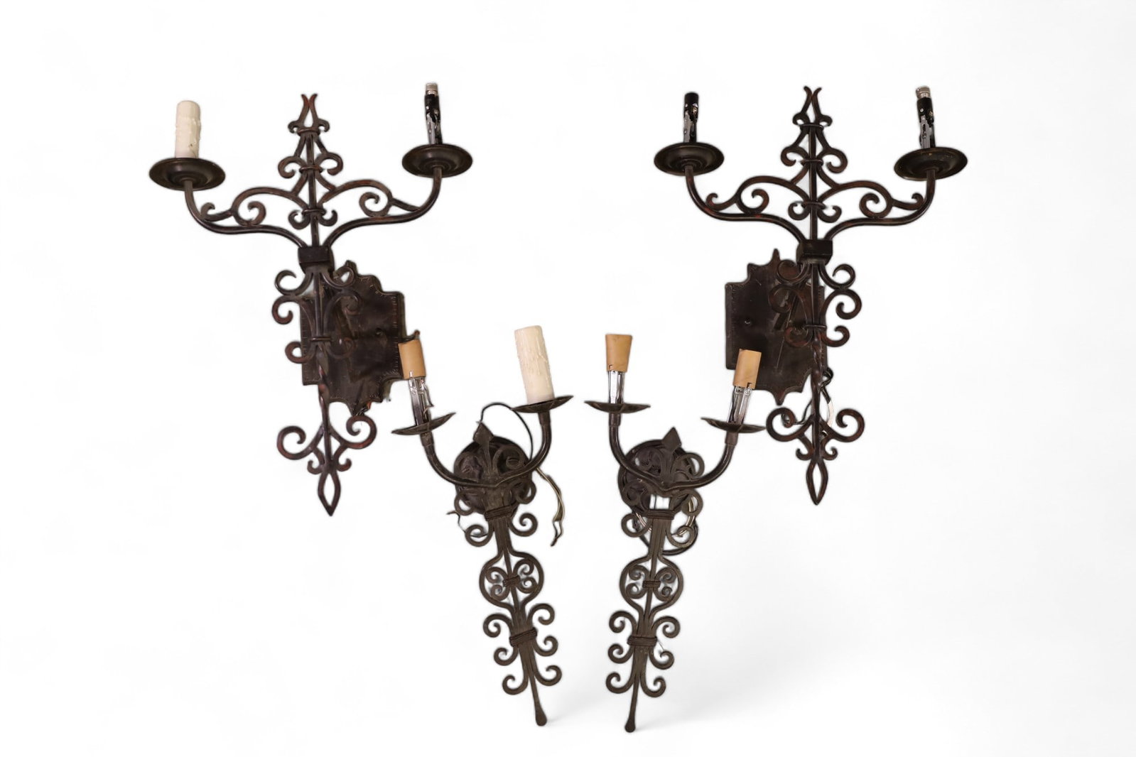 2 PAIRS OF SPANISH STYLE WALL SCONCES: TWO ARM SPANISH STYLE WALL SCONCES, MISSING FAUX CANDLE SLEEVES. 22" L & 20" L THIS ITEM EXCEEDS SIZE LIMITATIONS FOR IN HOUSE SHIPPING.